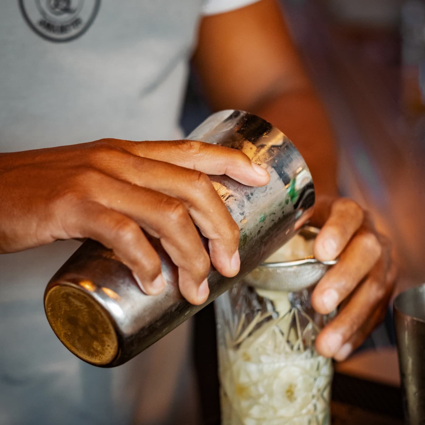 Barman at Bistro Lenster while preparing a cocktail