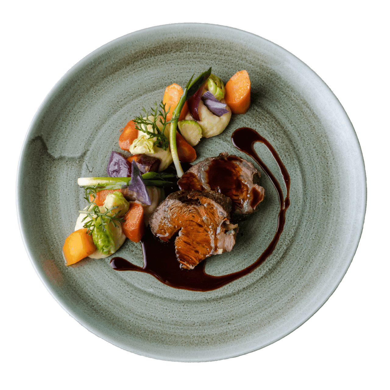 Meat dish decorated with vegetables